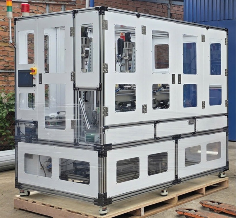 Máy xỏ găng tay tư động Máy xỏ găng tay tư động